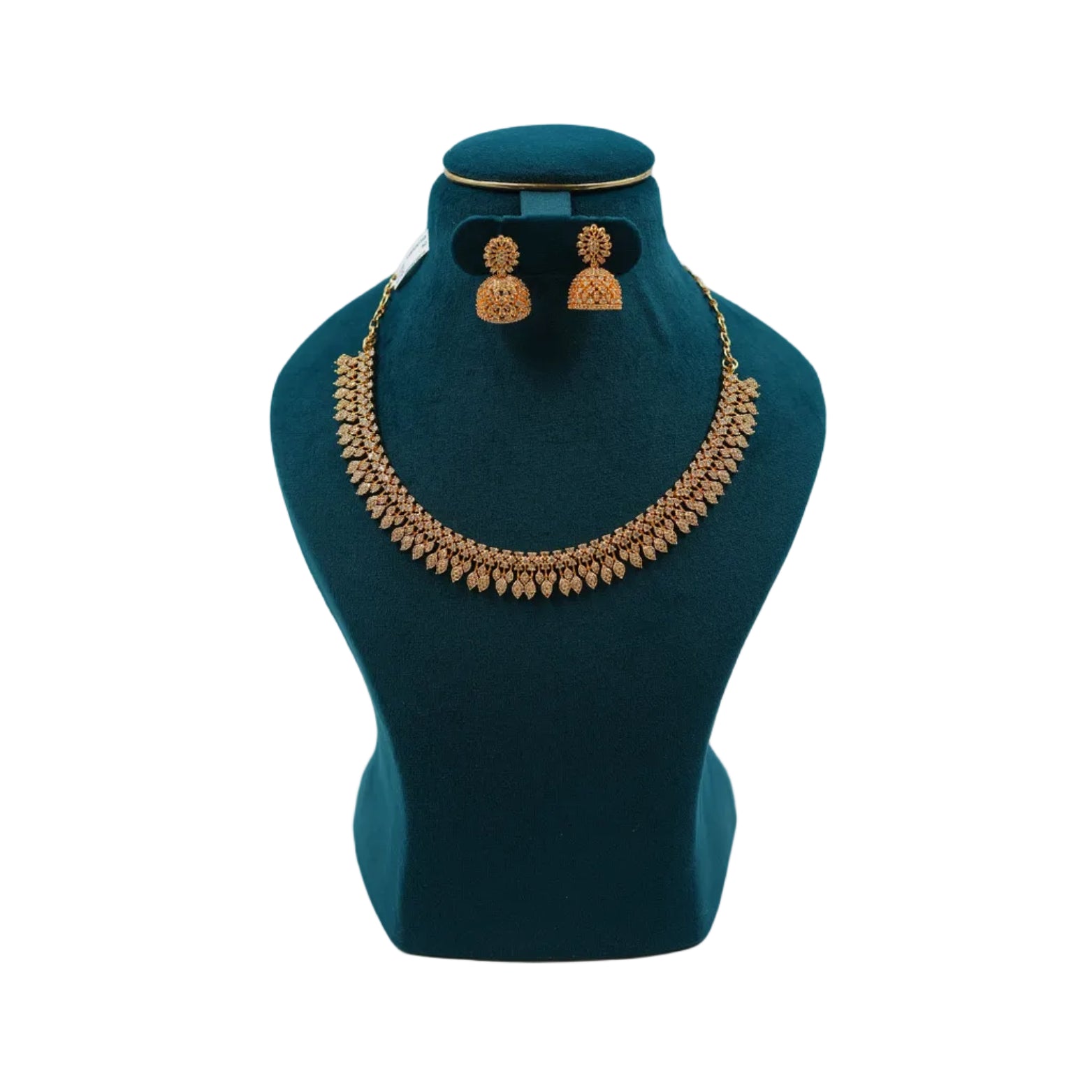 Lalithambike 1-gram gold antique necklace featuring a repeating filigree leaf-drop fringe and matching bell-shaped Jhumka earrings on a teal jewelry bust.